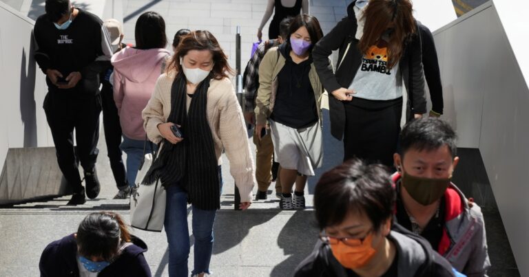 2021-12-01T075957Z_1775309310_RC2E5R9FCCMK_RTRMADP_3_HEALTH-CORONAVIRUS-HONG-KONG