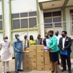 Mrs.-Cynthia-Lumor-right-presenting-200-Samsung-Galaxy-A7-tablets-to-the-Director-General-of-the-Ghana-Health-Service-Dr.-Patrick-Kuma-Aboagye-left