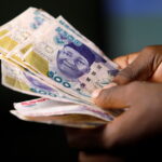 FILE PHOTO: Nigerian naira banknotes are seen in this picture illustration