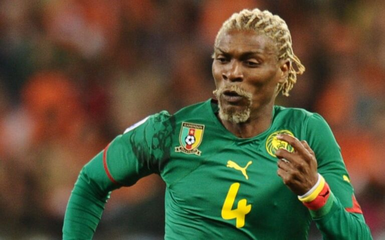 110253166_FILES_This_file_photo_taken_on_June_24_2010_shows_Cameroons_defender_Rigobert_Song_eyeing_trans_NvBQzQNjv4Bq1ZQBhQNEsp4c0DrJHyqZ_j6DYZquIG2yzjornQwKKO4